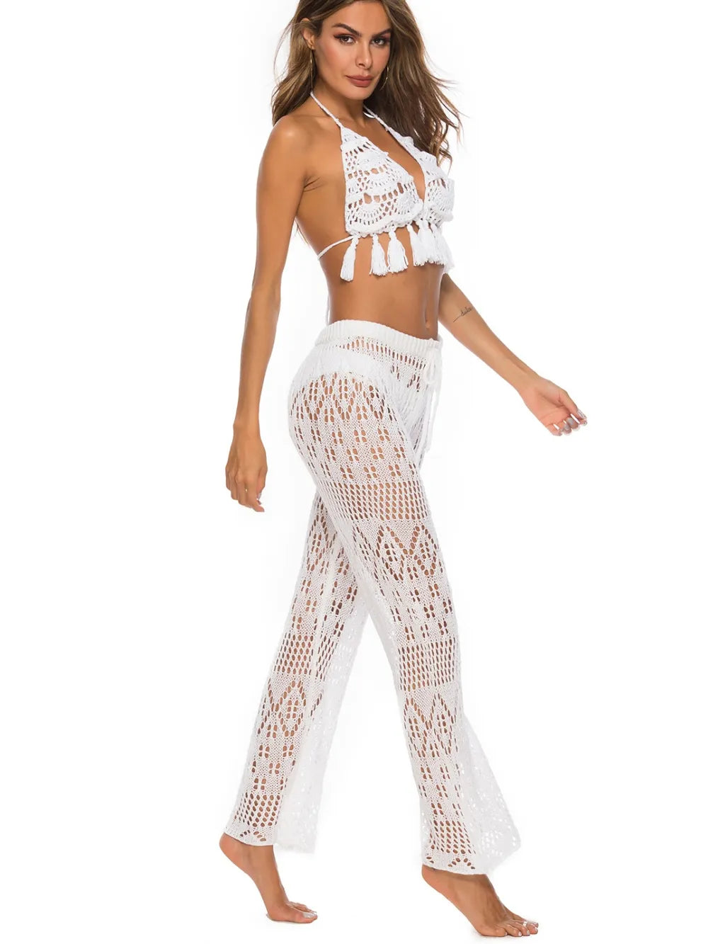 Straight-leg swim pants cover up with side cutouts; lightweight, quick-dry fabric and adjustable waist for beach-to-street style.
