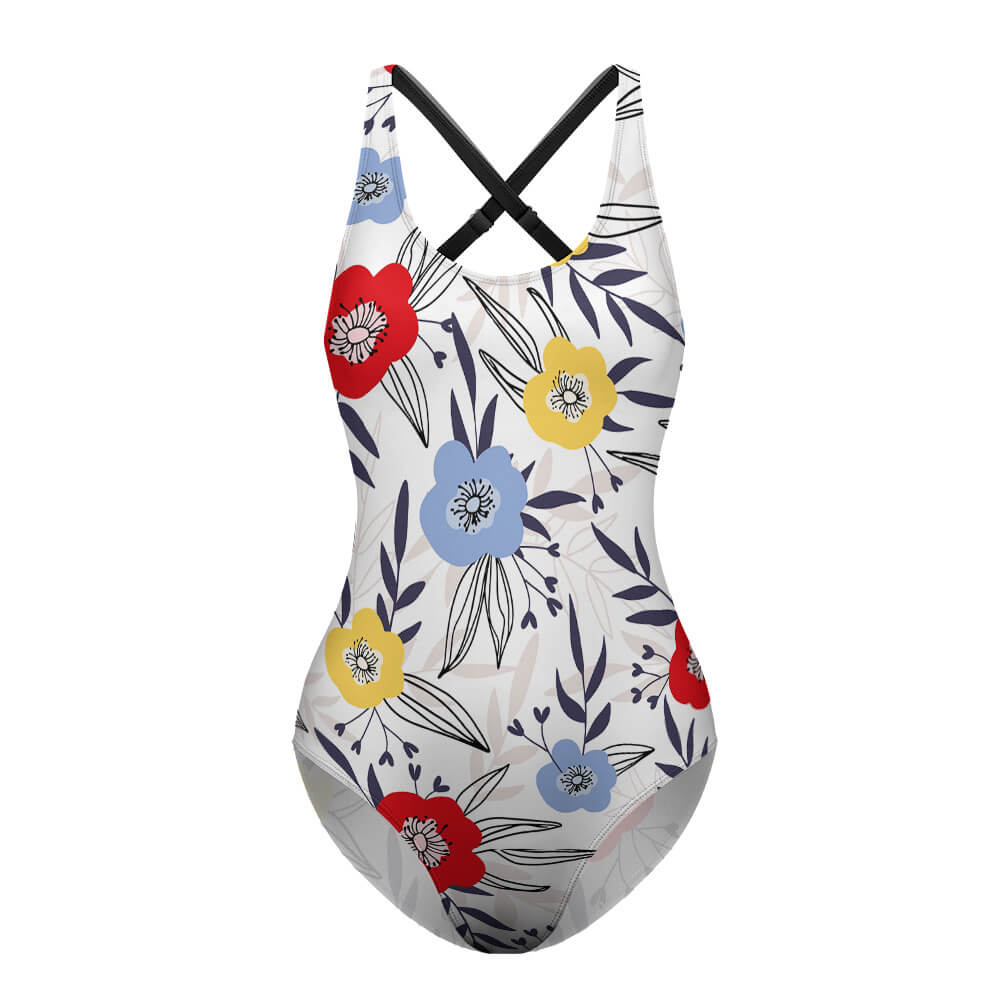 A floral swimsuit against a white background. 