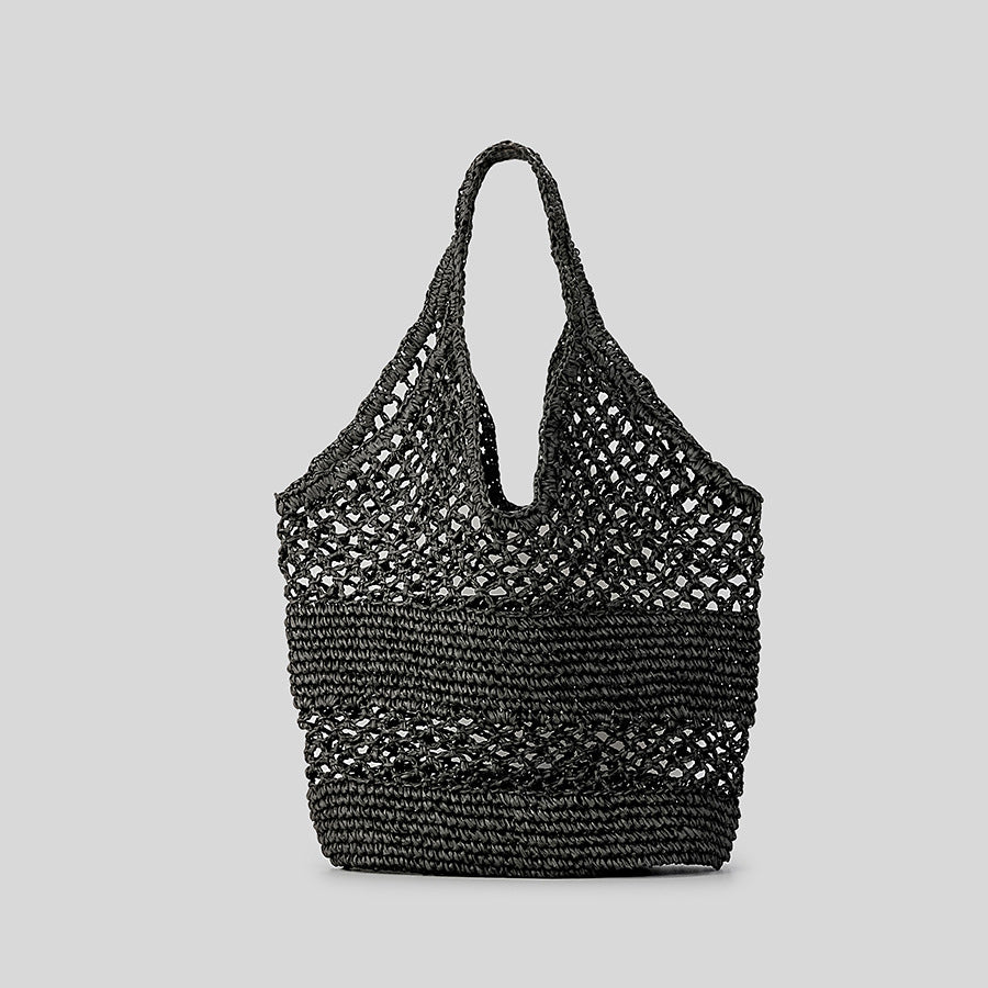 Woven tote bag on a light gray background