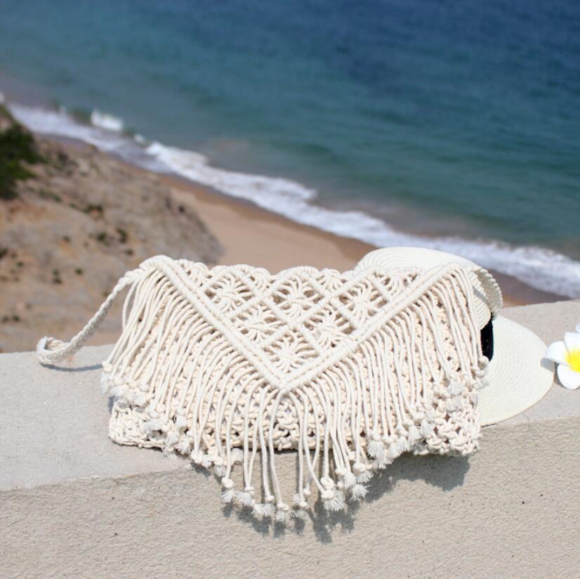 Woven handbag against a white background