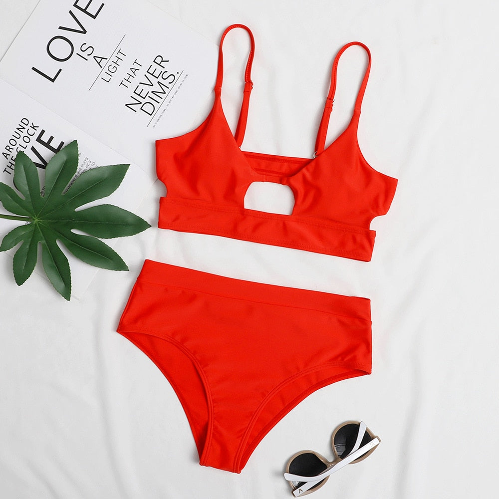 Low‑waist terylene bikinis set in solid color; two‑piece swimwear with flattering low‑rise bottoms and supportive top, quick‑drying and durable for beach and pool wear.