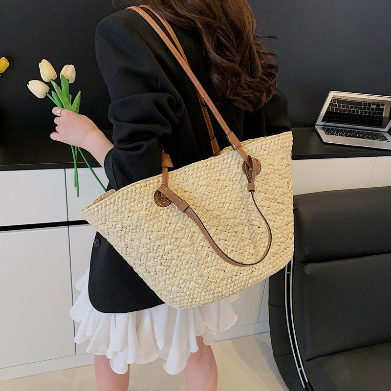 Woven handbag in an office sold at PeachyBeanz