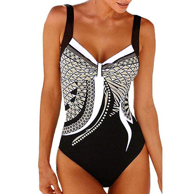 Vintage‑style push‑up printed swimsuit for women made of polyester and spandex, displayed on a plain background.