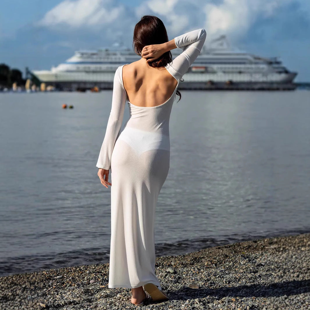 This slim‑fit dress cover up features a backless design and a smooth, breathable fabric that drapes close to the body for a flattering, streamlined look.