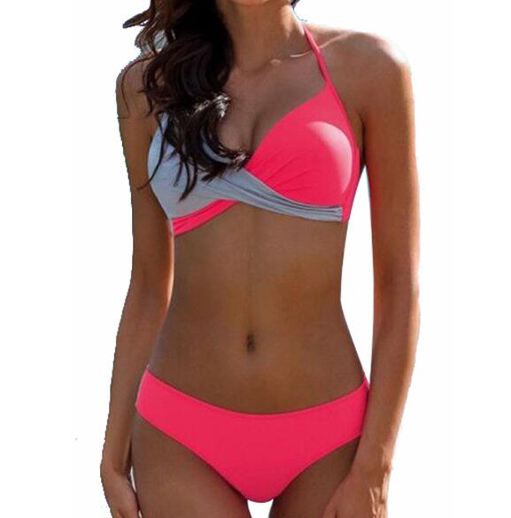 Two‑piece women’s bikini set featuring a padded push‑up top with spaghetti straps and a low‑waist patchwork bikini bottom, displayed in a flat lay on a neutral background.