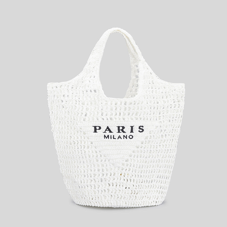 Woven tote bag with 'Paris Milano' text on a light gray background