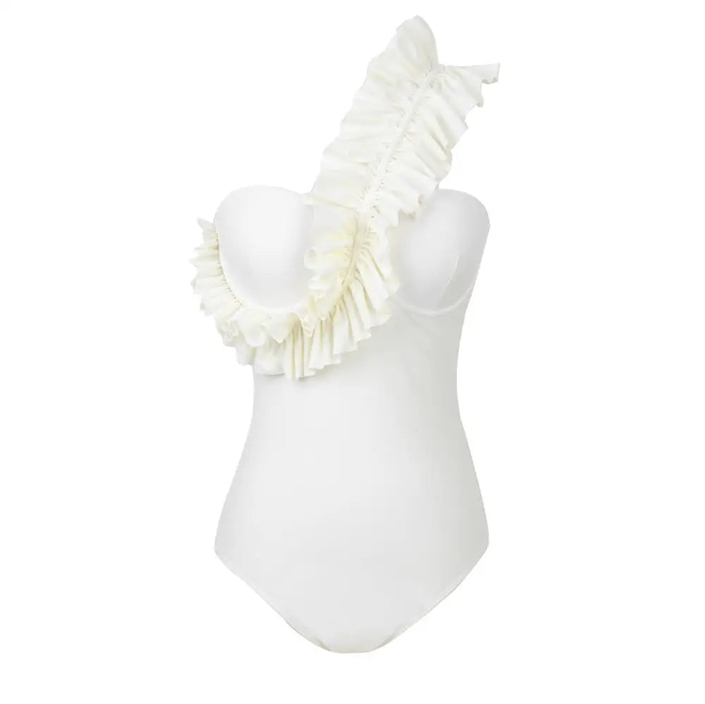 White ruffle backless one‑piece swimsuit with high‑cut leg and ruffle trim, shown against a neutral background.