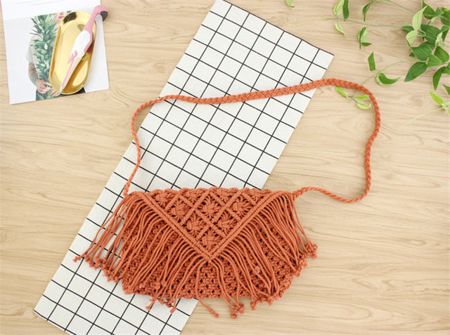 Woven handbag against a white background