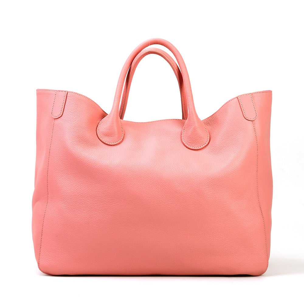 Pink bag with a white background sold at PeachyBeanz.