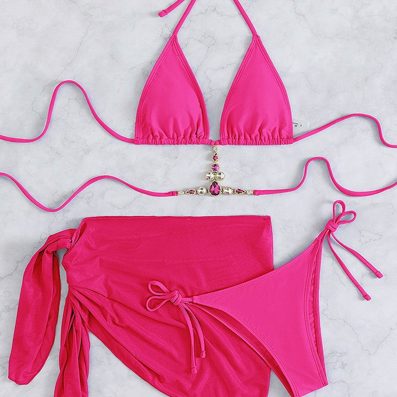 Diamond‑encrusted two‑piece bikini featuring a jeweled triangle top with adjustable straps and low‑rise bottoms in smooth quick‑dry fabric.