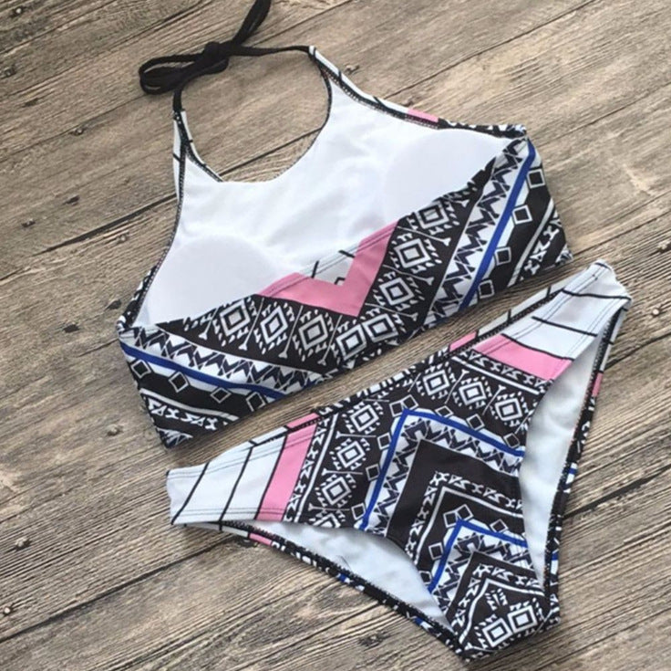 Two‑piece printed bikini set featuring a patterned bikini top and matching high‑waist bottoms displayed against a plain background.