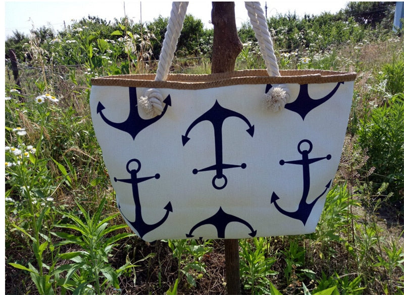 White tote bag with white anchor pattern on a white surface sold at PeachyBeanz