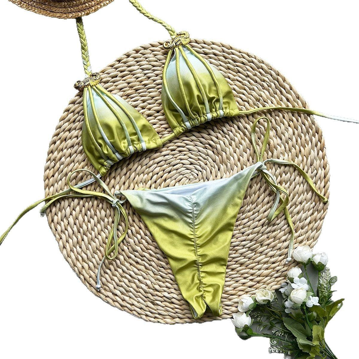Yellow bikini set with gold accents on a white background