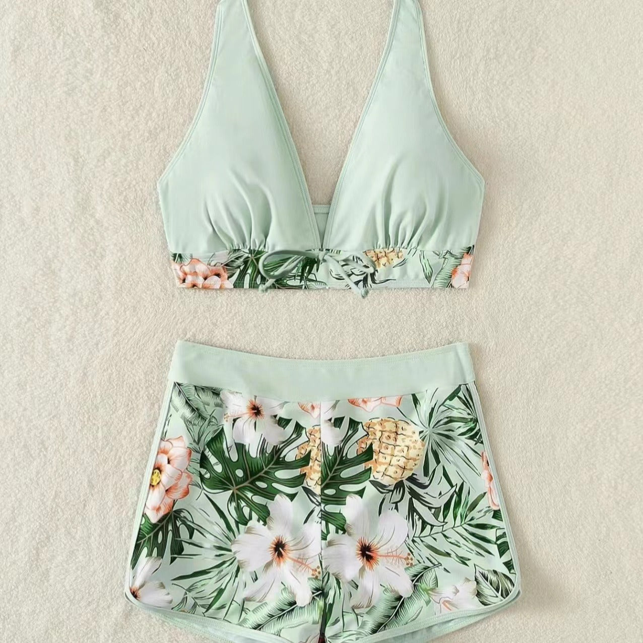 Two‑piece high‑waisted sports bikini set with supportive top and athletic fit.