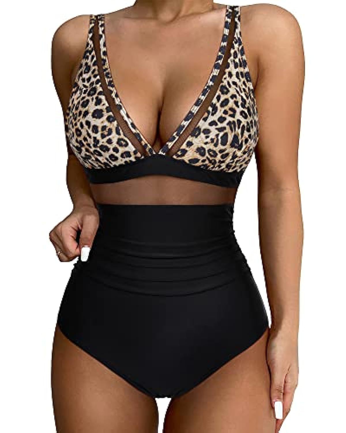 High‑waisted one‑piece swimsuit with mesh detailing, displayed on a clean studio background.