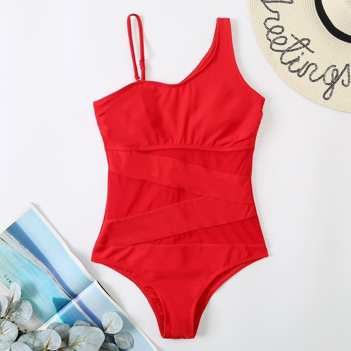 Red swimsuit with a tropical background sold at PeachyBeanz