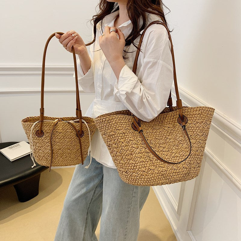 Woven handbag in an office sold at PeachyBeanz