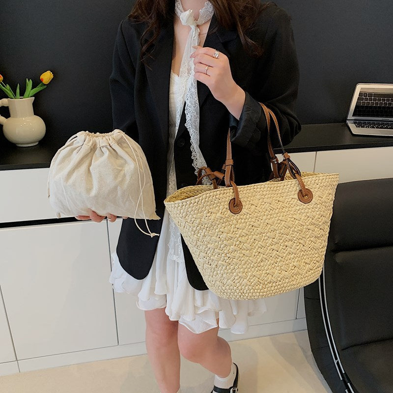 Woven handbag in an office sold at PeachyBeanz