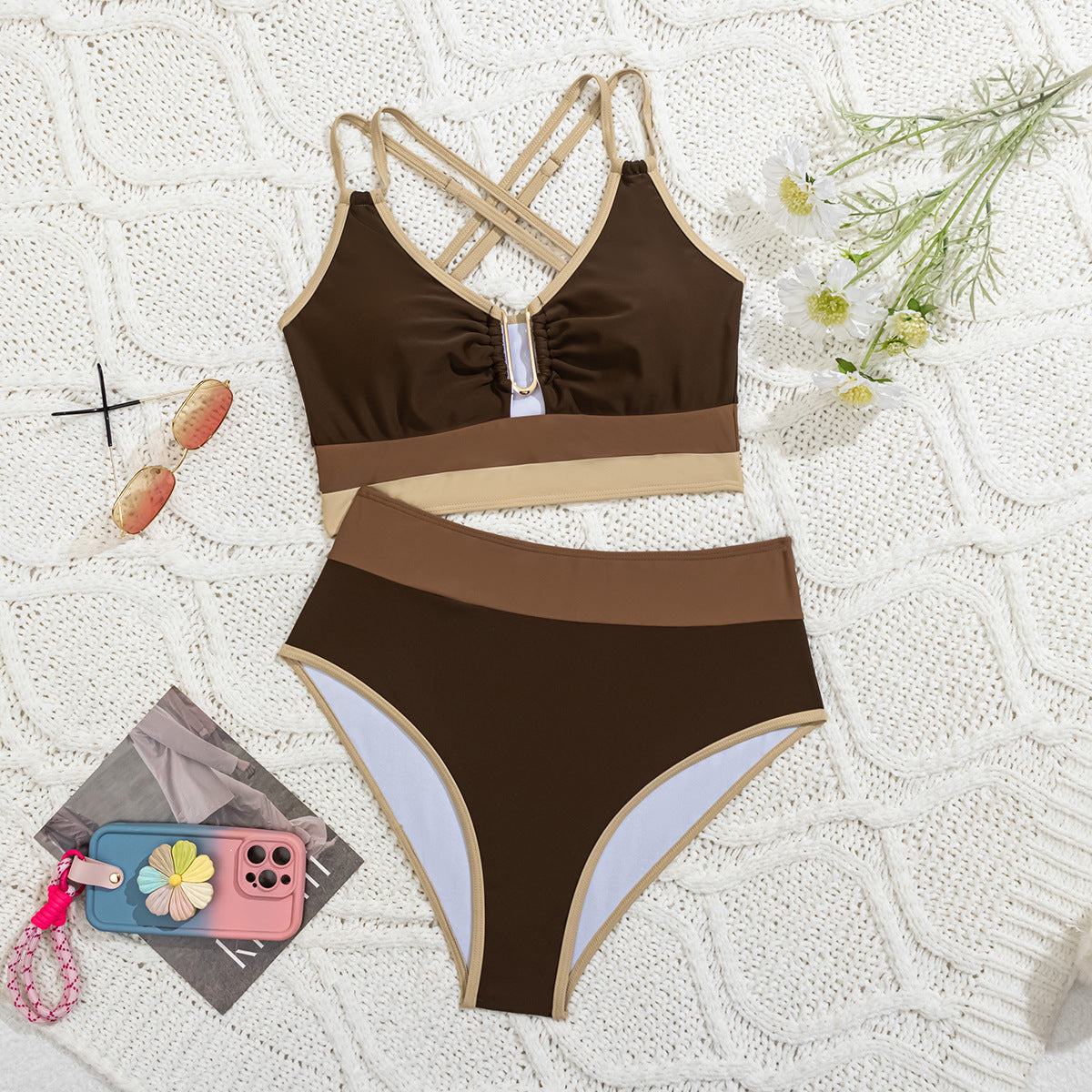 Two toned two-piece swimsuit against a white background