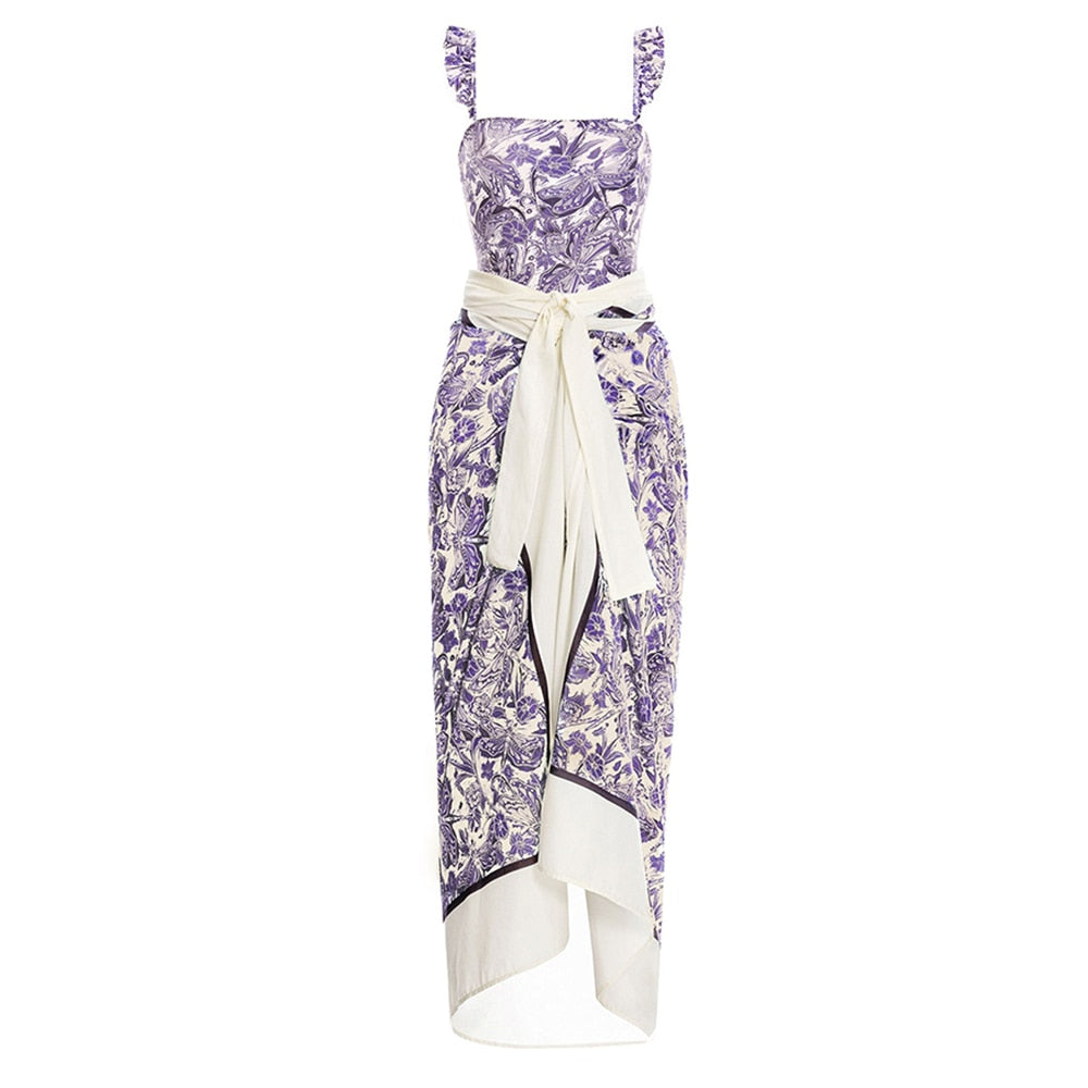 Purple floral dress with a white belt on a white background