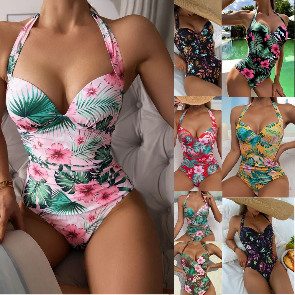 Person wearing floral swimsuit in an indoor setting.
