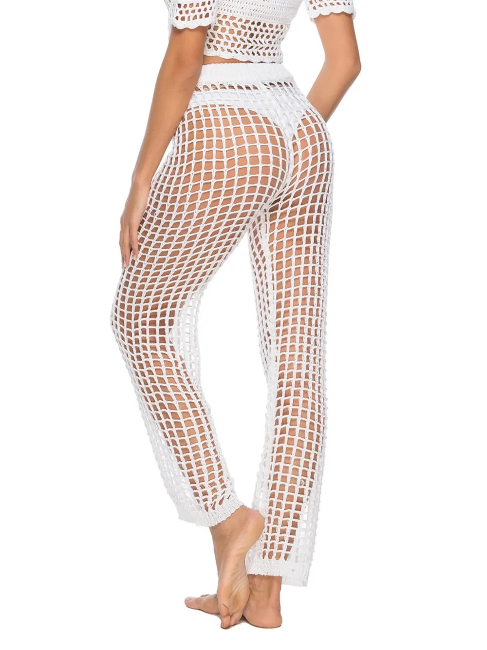 High‑waist cutout swim cover‑up pants with tie‑up closure in a solid color, displayed on a plain background.