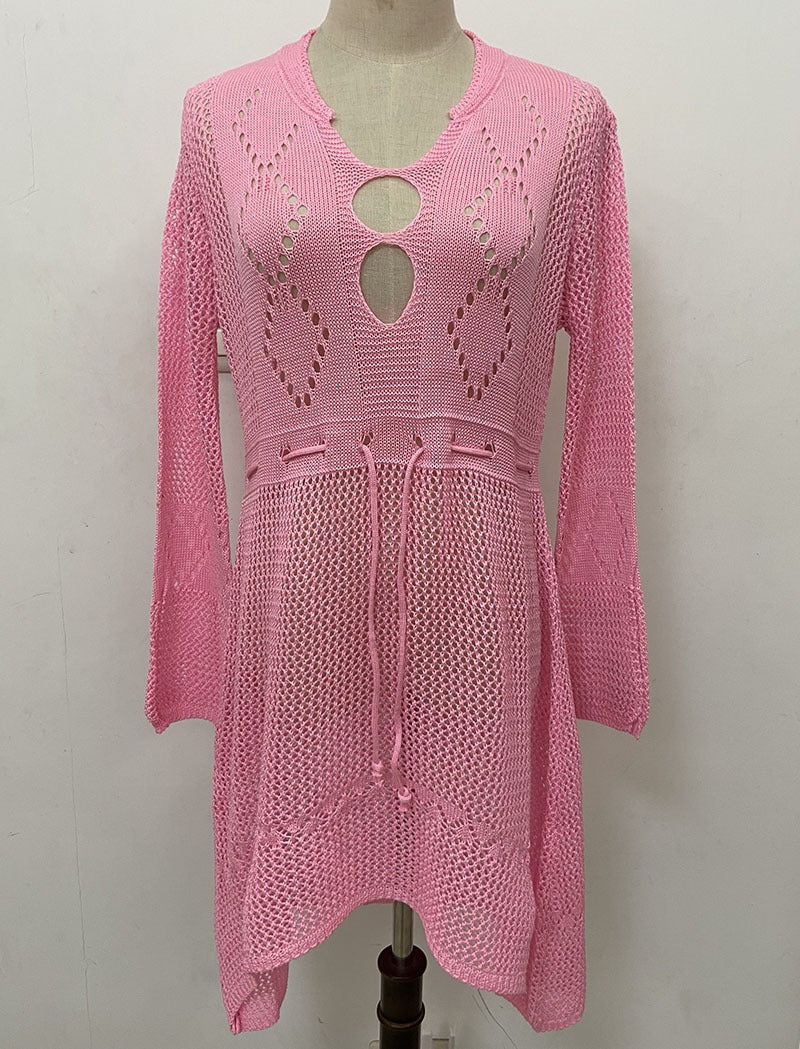 Lightweight flared beach cover shirt with hollow cutout pattern and relaxed fit.