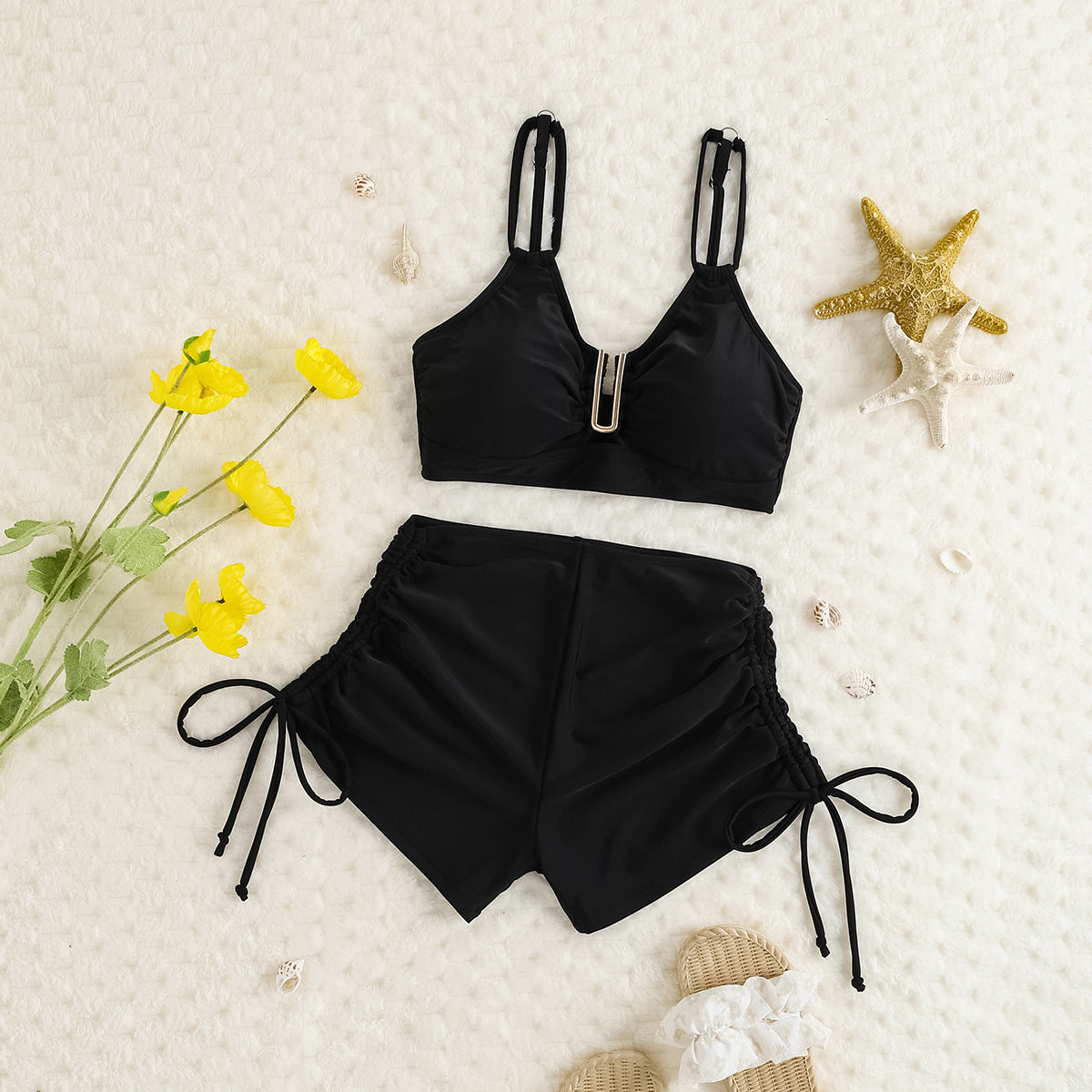 Black bikini with a neutral background