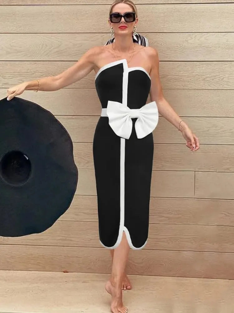 Vintage‑style two‑piece swimsuit with ruched bodice and retro cut