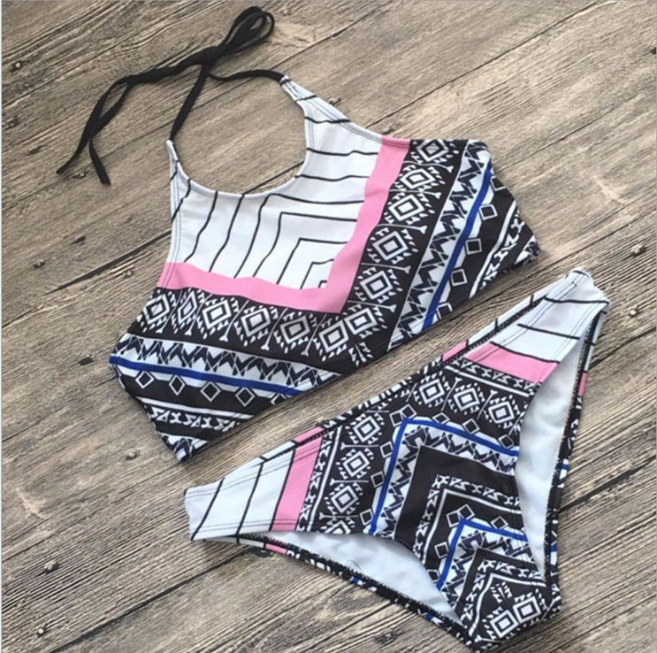 Two‑piece printed bikini set featuring a patterned bikini top and matching high‑waist bottoms displayed against a plain background.