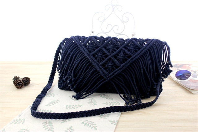 Woven handbag against a white background
