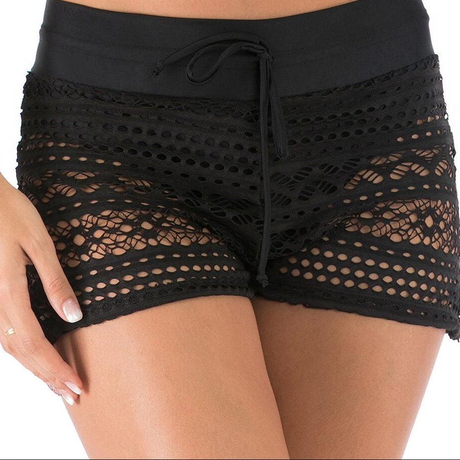Black lace shorts worn by a person on a white background sold at PeachyBeanz.