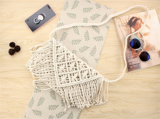 Woven handbag against a white background
