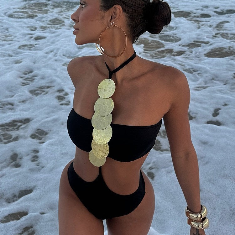 One‑piece swimsuit with blue cross‑border print and scoop neckline.