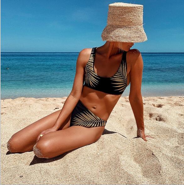 High‑waist polyester bikinis set B4073BK in natural color; wire‑free top with removable pads, available in solid, floral, print, animal, and leopard patterns, fits true to size.