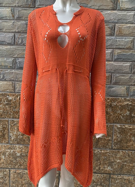 Lightweight flared beach cover shirt with hollow cutout pattern and relaxed fit.