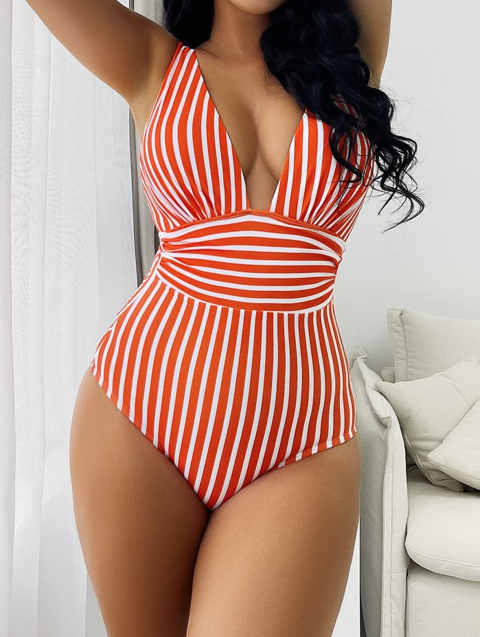 Striped one‑piece swimsuit with multicolor horizontal stripes, adjustable straps, and high‑cut leg.