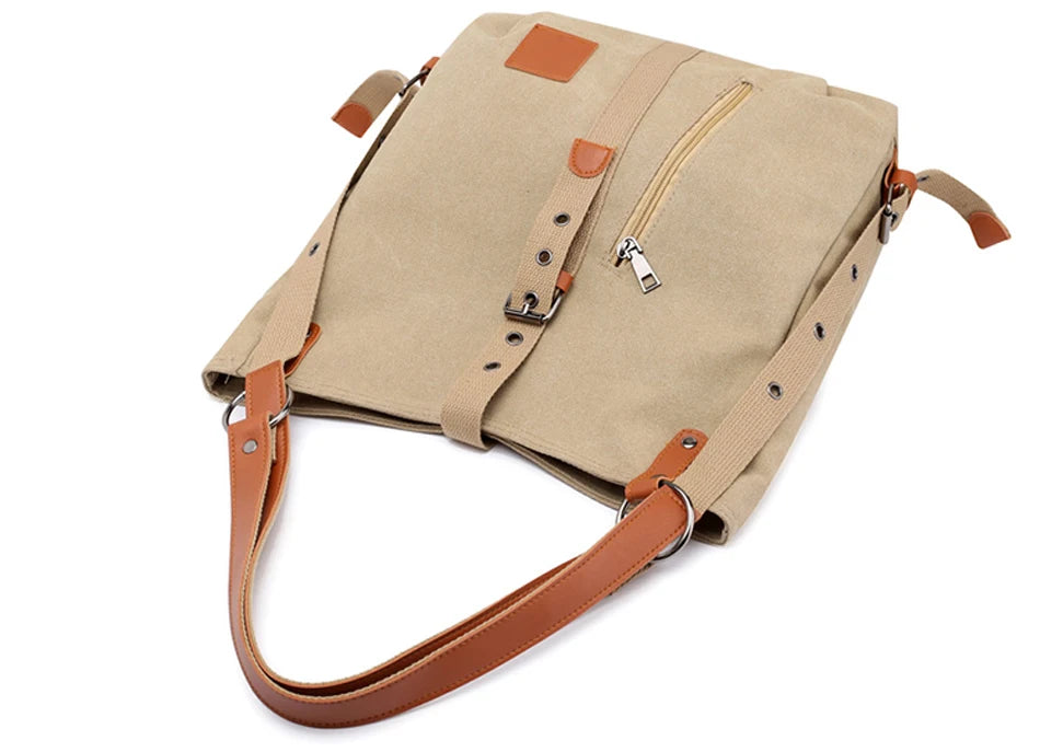 Women’s soft canvas backpack with zipper closure, top handle, and shoulder straps, featuring external pockets and a casual everyday design.