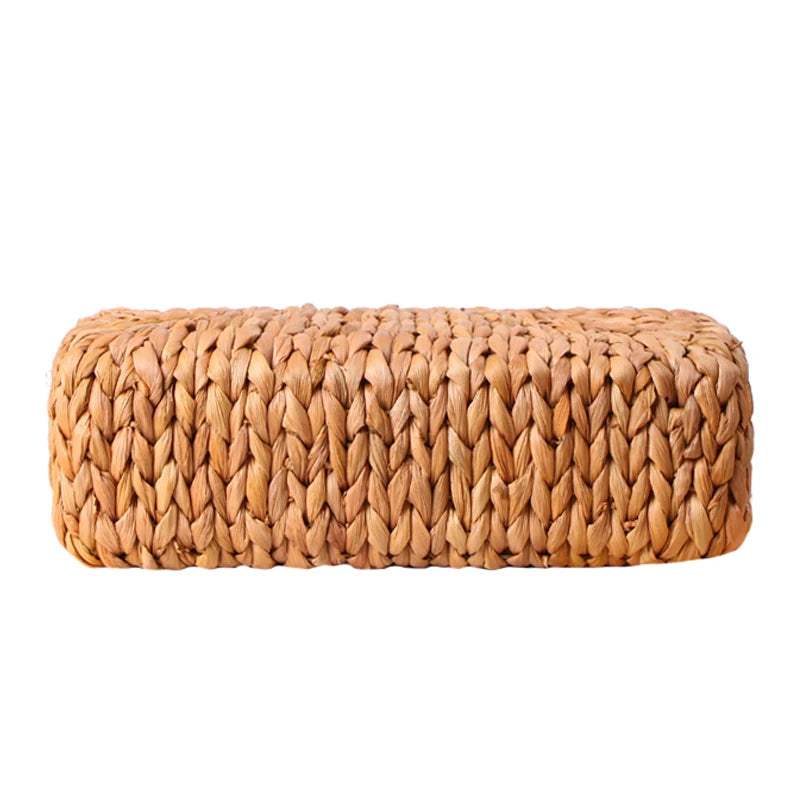 Woven cylindrical basket on a white background