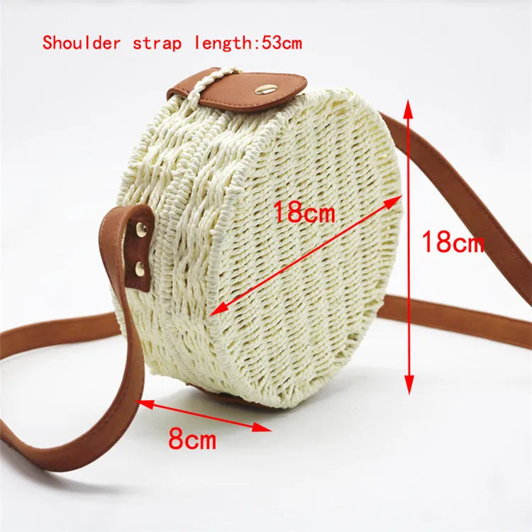 Woven bag with brown strap and measurements on a white background
