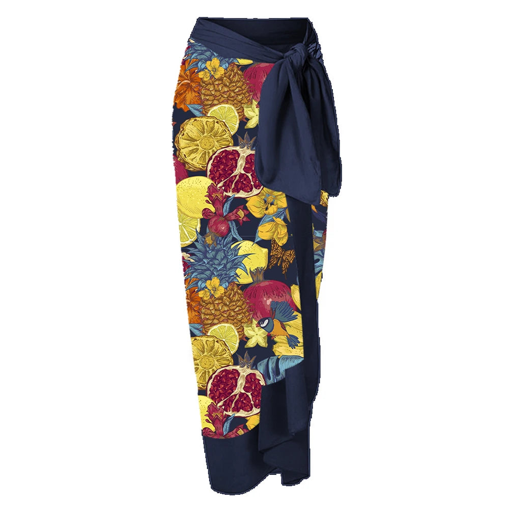 Navy blue wrap skirt with colorful fruit pattern on a white background