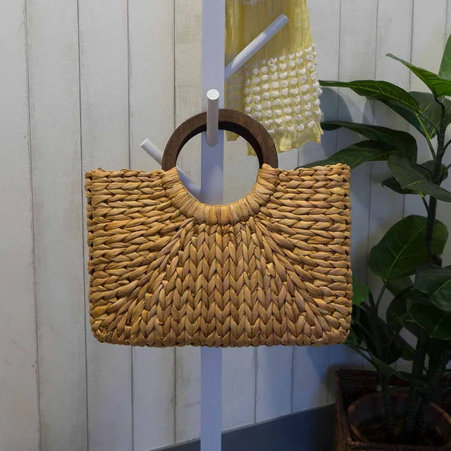 Authentic handmade woven straw handbag sold at PeachyBeanz