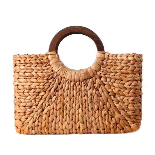 Authentic handmade woven straw handbag sold at PeachyBeanz