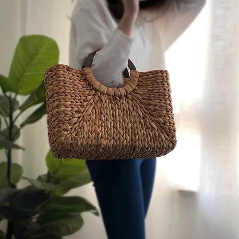 Authentic handmade woven straw handbag sold at PeachyBeanz