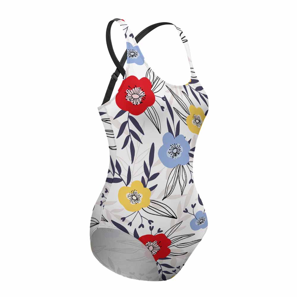 A floral swimsuit against a white background. 